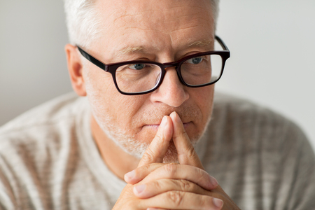 Man pondering insurance choice.